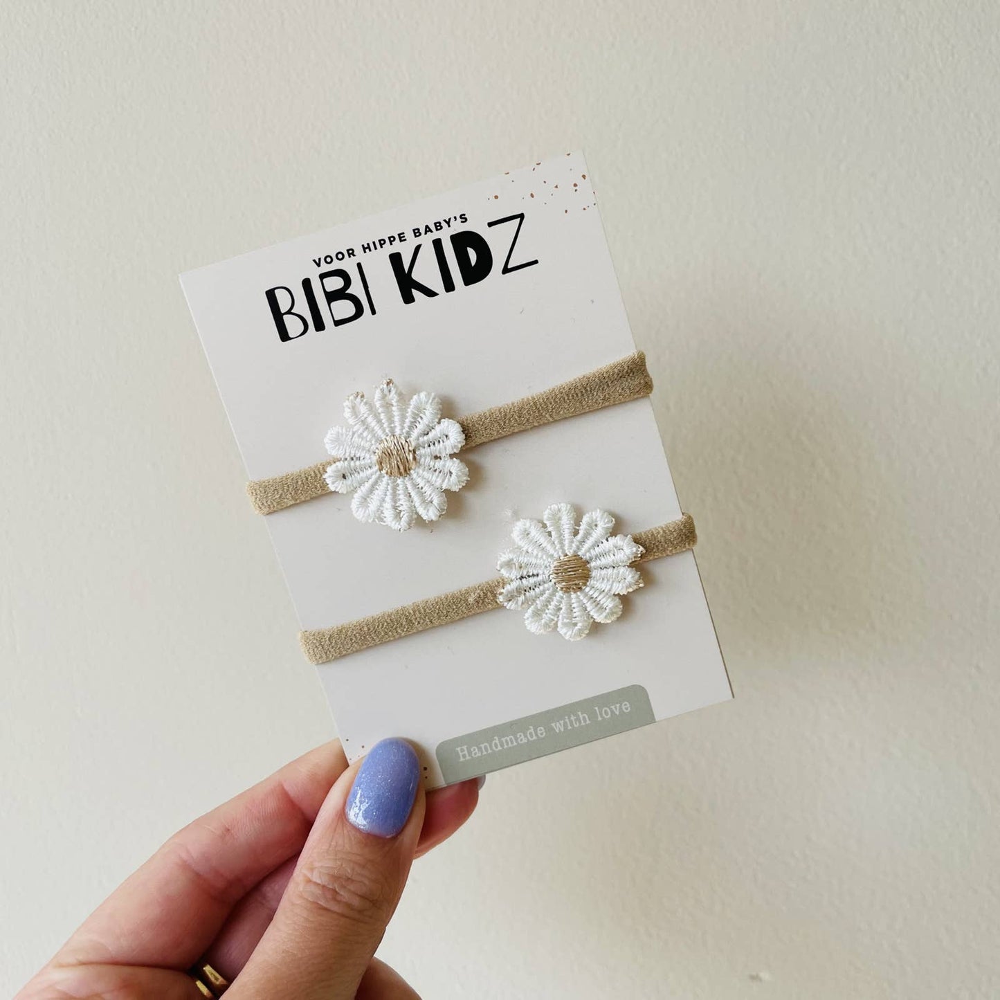 Haar elastiek beige/ecru